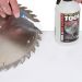 Click For Bigger Image: Cleaning a circular saw blade with a toothbrush