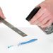 Click For Bigger Image: Spraying cleaner on to a metal file