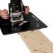 Click For Bigger Image: Cutting the open riser with the Trend Open Riser Staircase Jig.